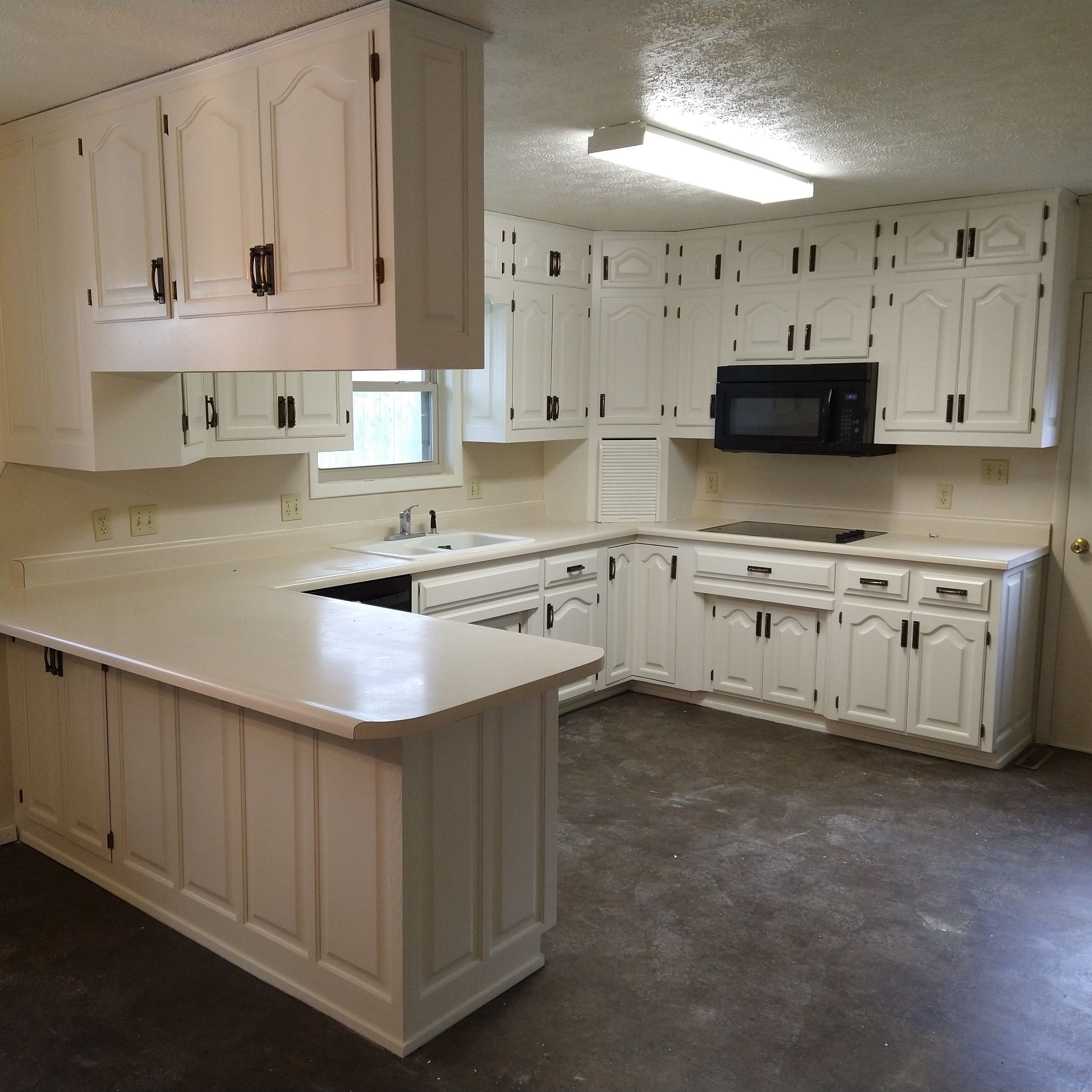 Durable Ivory Kitchen Cabinets Finished with Scuff-X Paint